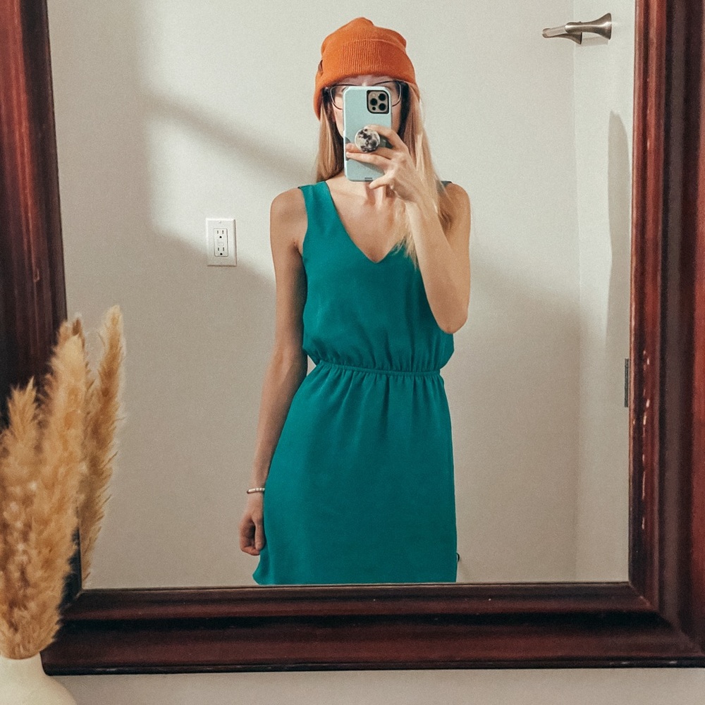 Turquoise cocktail dress with draped open back